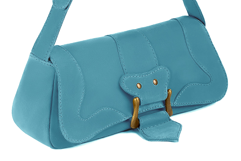 Handcrafted women's small luxurious elegant handbag in premium peacock blue leather. Perfect for elevated everyday style.   
                Choose from our luxurious collections of leather and fabric to perfectly match your handbags to your outfits.
